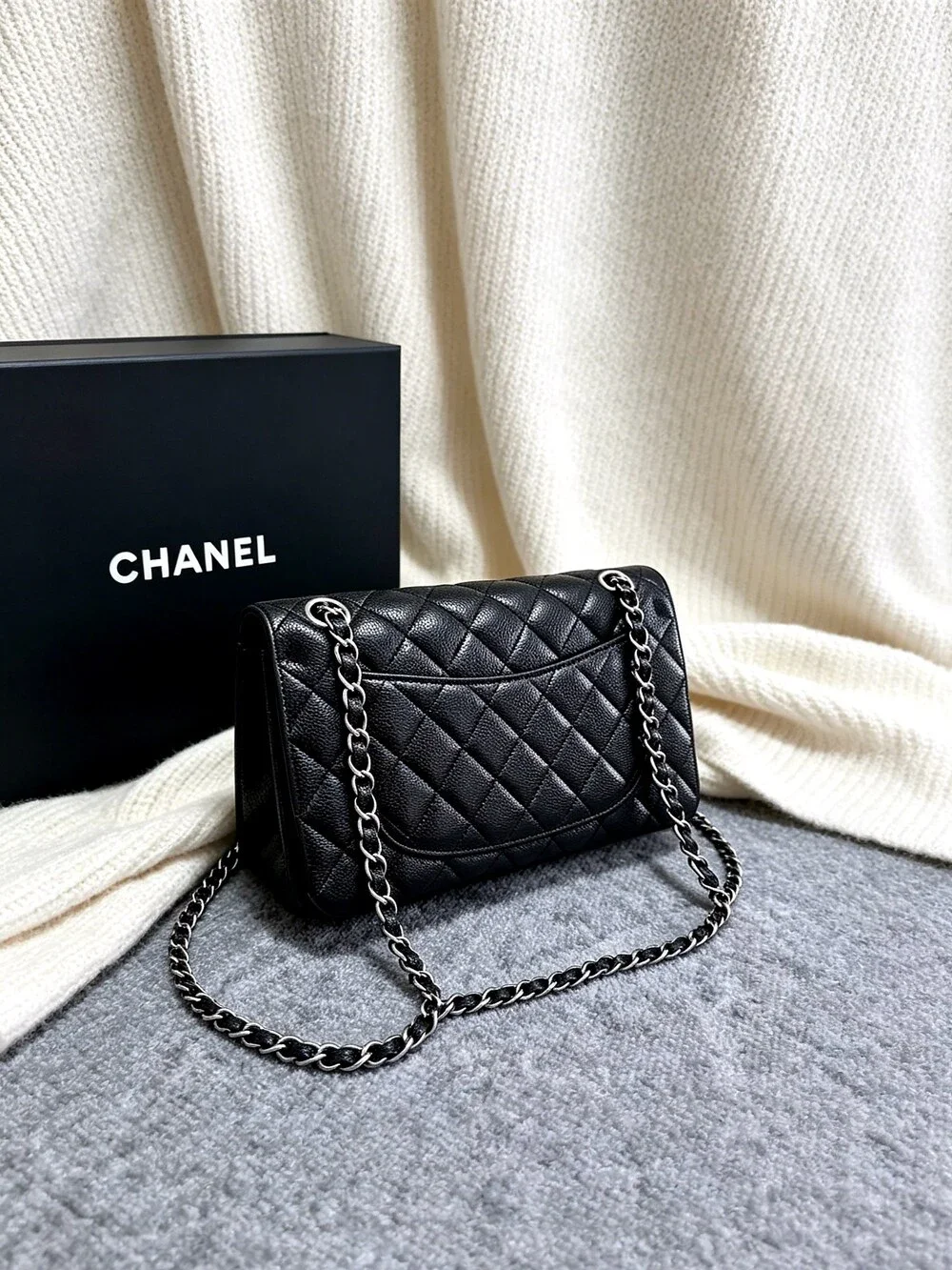 CHANEL Classic Flap Bag in Black Caviar Leather